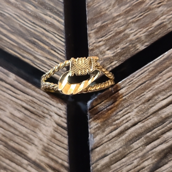 Nike Jewelry - Vintage Nike Gold Ring